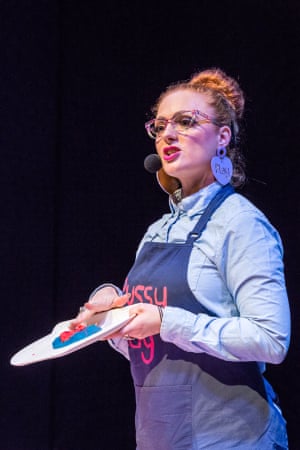 Strawberry Siren demons trates techniques on a plasticine vulva.