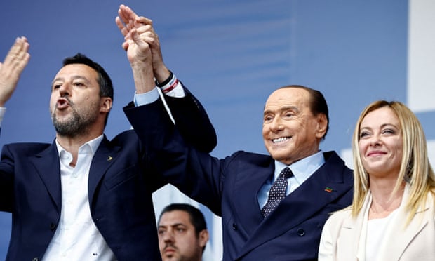 Matteo Salvini, the League leader, Silvio Berlusconi, the Forza Italia leader, and Giorgia Meloni of Brothers of Italy wave to supporters at the rally in Rome.