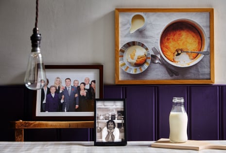 Memories of a culinary maestro: Raymond Blanc's Taste of Home as depicted by family photos and a bottle of milk on a chopping board. One of the 'family' photos is of his recipe for comte souffle – it's one of his favourite memories.