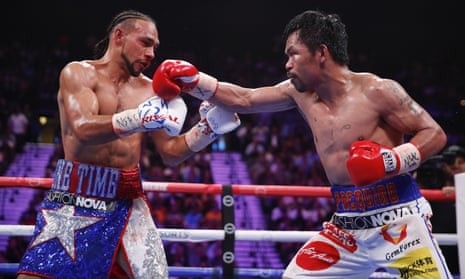 Manny Pacquiao, right, exchanges punches with Keith Thurman in the seventh round.