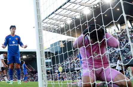Manchester United’s Lisandro Martínez gestures as the goalkeeper kneels dejectedly after an own goal
