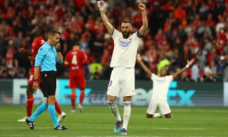 Karim Benzema punches the air in celebration as Real Madrid’s Champions League triumph is confirmed