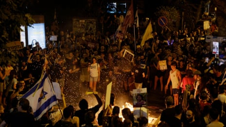 Israelis take to the streets as Netanyahu remains defiant over ceasefire deal – video