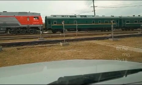 A train resembling Kim Jong Un’s – green with yellow trimmings – near Khasan.