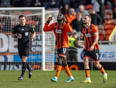 Emmanuel Agyei celebrates after doubling the home side’s lead at Tannadice