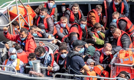 Migrants arriving at Dover in a Border Force rescue boat earlier this month