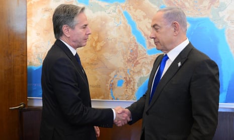 Antony Blinken shakes hands with Benjamin Netanyahu in Jerusalem.