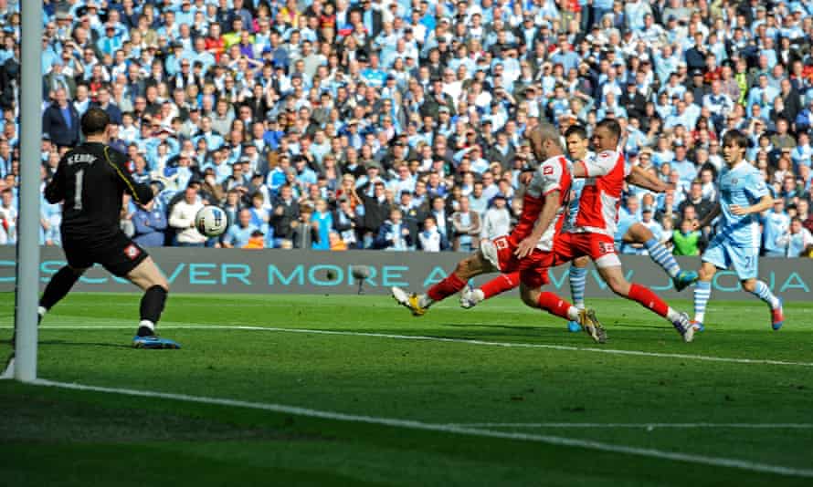 Sergio Agüero fires in the injury time winner against QPR that won Manchester City the league in 2011-12