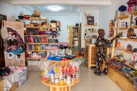 Alimatou Sadiya, manager of Afro Feewi in Dakar, Senegal, organises the store’s handmade and organic products, April 2021