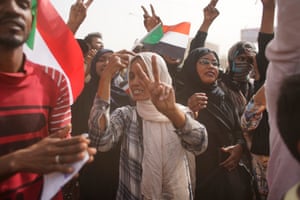 Celebrations outside the Sudanese army headquarters in Khartoum