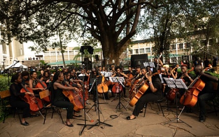 Kenyan classical musicians give an outdoor performance in Nairobi on the day of Ma’s concert.