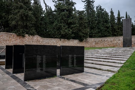 Blocks of black marble with the names of the dead written on them
