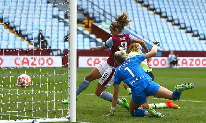 Daly scores her second goal.