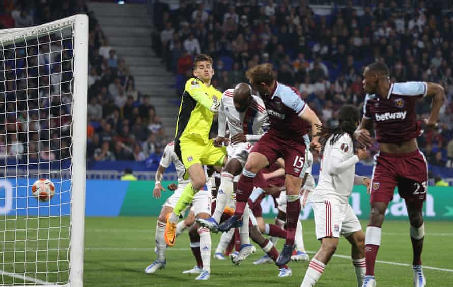 Craig Dawson stoops to head West Ham’s opener.