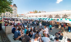People walking and eating at  Open kitchen, Ljubljana, Slovenia