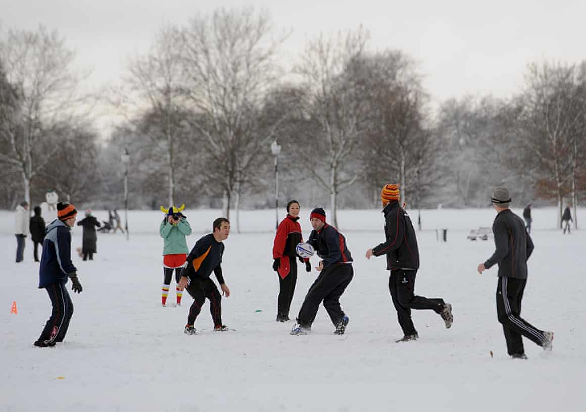Rugby union on Clapham Common as thick snow covers London