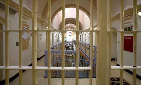 Looking through prison bars into a cell block in Wandsworth Prison. Wandsworth Prison is one of the largest prisons in the UK.