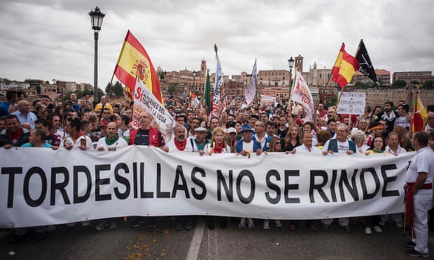 Pro-bullfighting residents demonstrate in the streets of Tordesillas, Spain