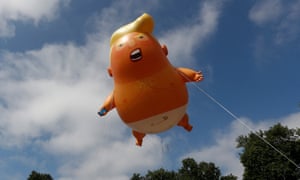 The blimp portraying US President Donald Trump flying above Parliament Square.