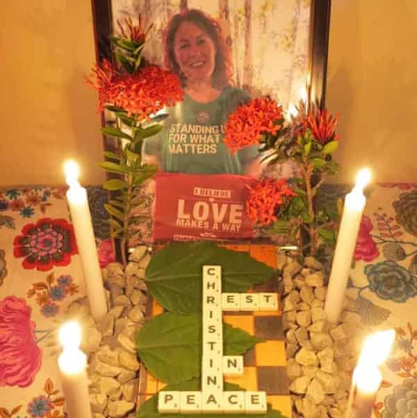 Shrine for Christina Coombe, who died in May 2019, with candles and a sign reading “Rest in peace”
