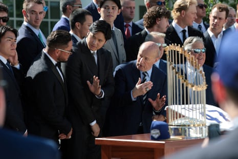 Los Angles Dodgers Shohei Ohtani, Yoshinobu Yamamoto and Dodgers part-owner Stan Kasten waited for Donald Trump in the White House Rose Garden on Thursday.