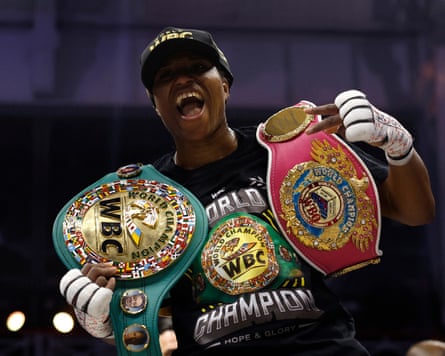 Caroline Dubois shows off her two world heavyweight belts