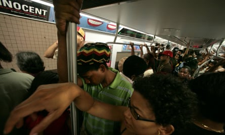 New York subway commuters on a crowded train.