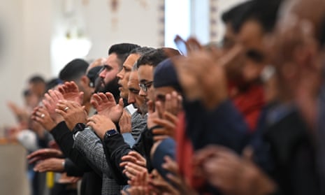 Worshippers participate in Eid al-Fitr prayers at the end of Ramadan, Lakemba mosque, Sydney.