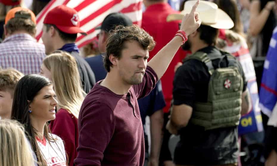 Charlie Kirk walks through the crowd at a pro-Trump rally outside the Maricopa county recorder's office on 6 November 2020.