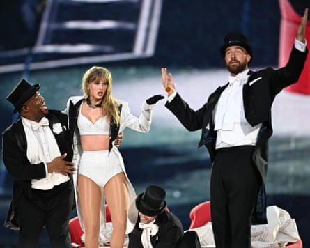 Travis Kelce (right) onstage with Swift at Wembley, 22 June 2024.