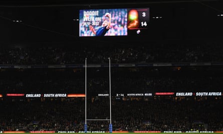 A tribute to Doddie Weir is displayed on a screen at the match between England and South Africa at Twickenham.