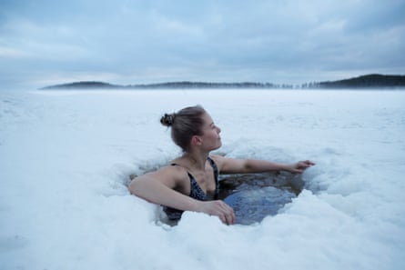Finns think nothing of drilling a hole in the ice for a dip.
