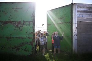 Pilton, UK. Michael Eavis opens the gate for the start of this year’s Glastonbury festival at Worthy Farm in Somerset
