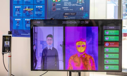 A ‘Smart AI Epidemic Prevention’ made by the company SenseTime, in Shenzhen, can detect if people have a fever and identify faces even behind a mask.