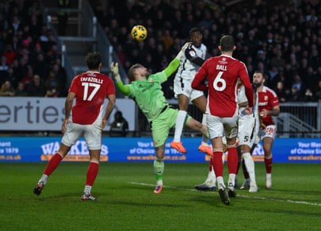Bromley's Nicke Kabamba scores their second goal.