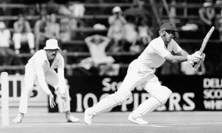 England batsman Geoff Boycott is watched by South Africa fielder Jimmy Cook during the first Test of the rebel tour in 1982.