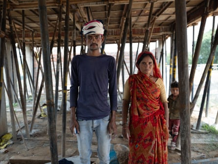 Inder and Laxmi Kumar at a construction site in Gurgaon.