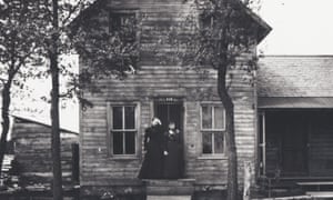 Two women standing in the doorway of a house, numbered 419, Black River Falls, Wisconsin, 1895. (Photo by Charles Van Schaick/Wisconsin Historical Society/Getty Images)