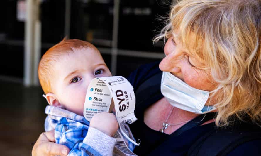 Dianne Wright kisses her grandson Mason Buckley at Sydney International Airport