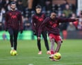 Ryan Gravenberch warms up for Liverpool at Fulham