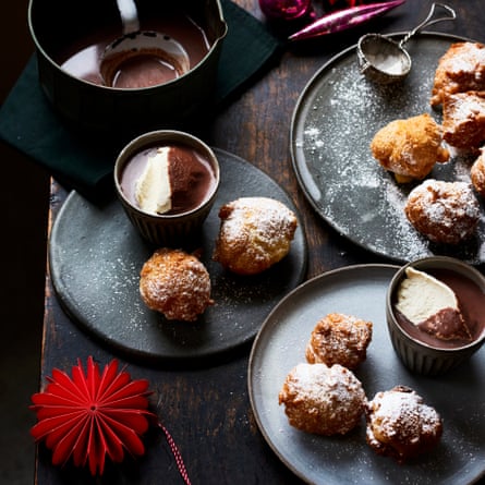 Fried puffs with hot chocolate and brandy cream.
