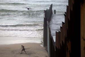 Playas de Tijuana, Mexico
A man works out next to the border wall between Mexico and the US.