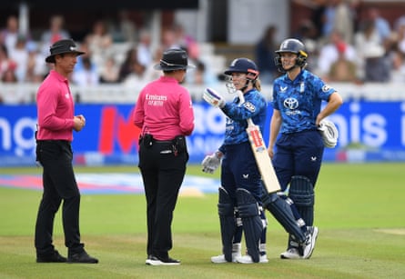 Tammy Beaumont in discussions with the umpires.