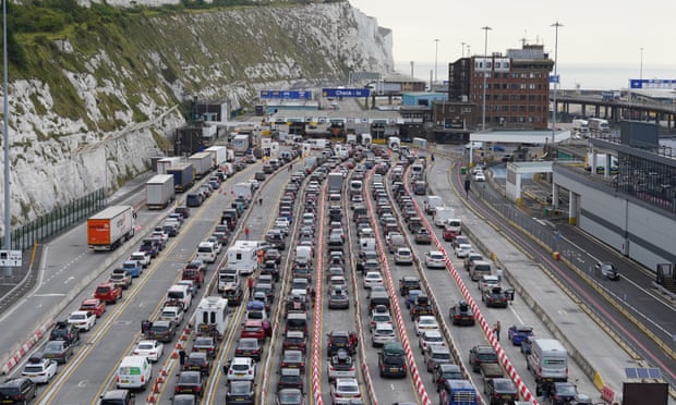 Cars queue at the check-in at the Port of Dover in Kent as  families embark on getaways following the start of summer holidays.