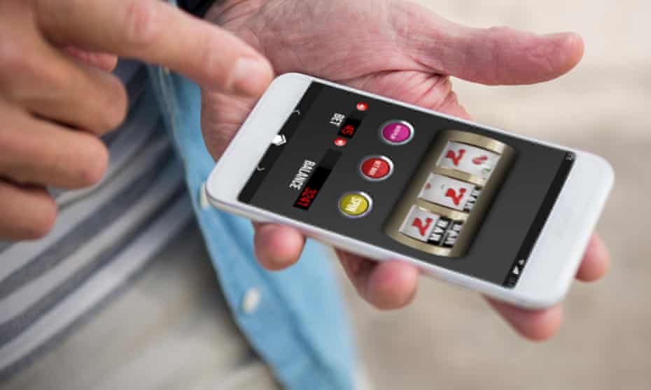A man using a gambling app.