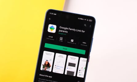 Google family link logo on phone screen