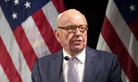 Rupert Murdoch pictured with American flag in the background