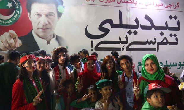 Supporters of Imran Khan celebrate in Karachi.