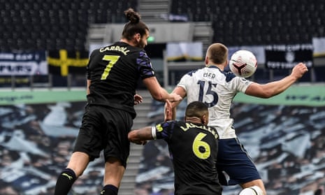 Andy Carroll's header hits Eric Dier on the arm.