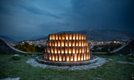 The cemetery at night, illuminated by candles by artist Marina Mimoza 